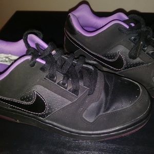 Black and purple nike shoes